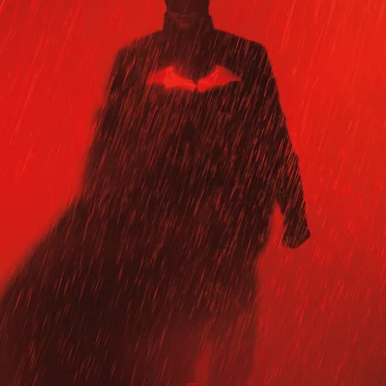 Red-toned Batman silhouette in falling rain with the Batman title