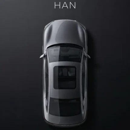 Top-down view of a gray BYD Han electric sedan on a dark poster