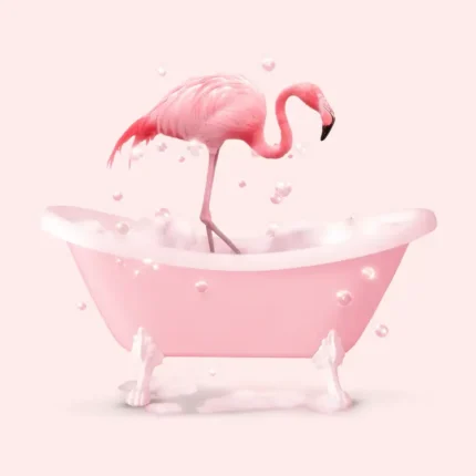 Pink flamingo standing in a pink clawfoot bathtub with soap bubbles