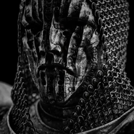 Warrior in a chainmail hood with a cracked carved mask in dark gray tones
