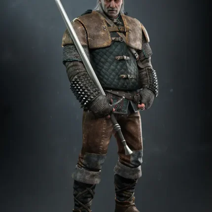 Gray-bearded older warrior in leather armor holding a long sword downward
