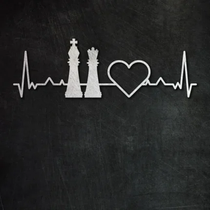 Heartbeat line passing through chess king, queen and a heart on a chalkboard