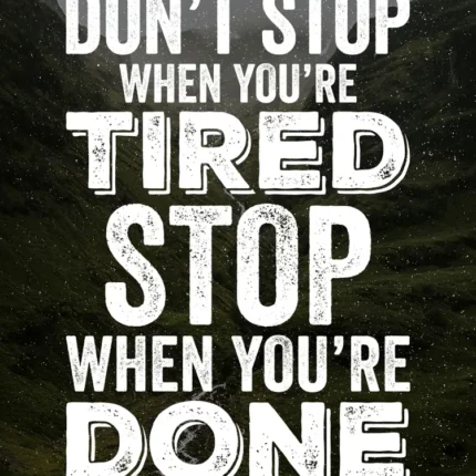 Motivational quote Don't stop when you're tired stop when you're done over a dark mountain landscape