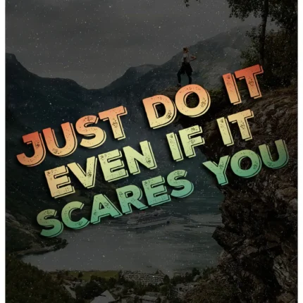 عبارة Just Do It Even If It Scares You فوق صورة وادٍ ومنحدر صخري