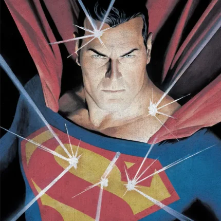 Close-up painted Superman in red cape with sparkles of light around his chest emblem