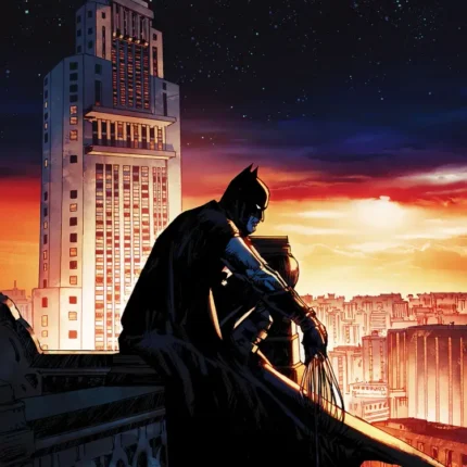 Batman crouching on a ledge above a city skyline at sunset with a tall tower and starry sky