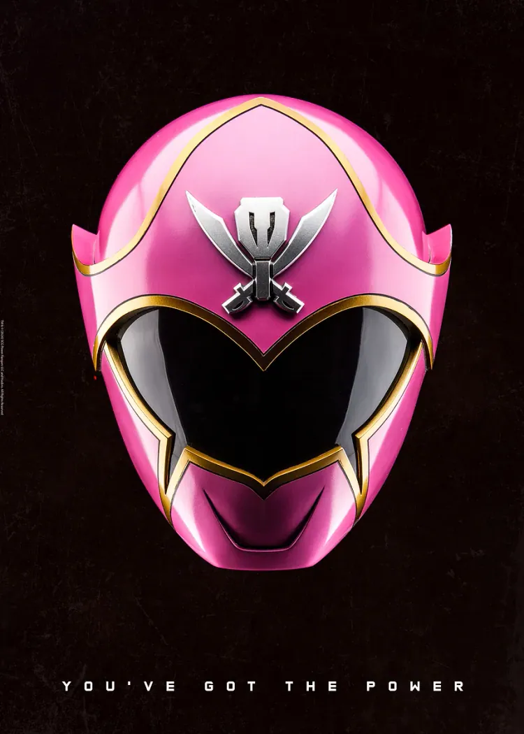 Power Rangers Pink Helmet With Crossed Swords Emblem Pink Power Rangers helmet with gold trim and a crossed swords emblem on a black background