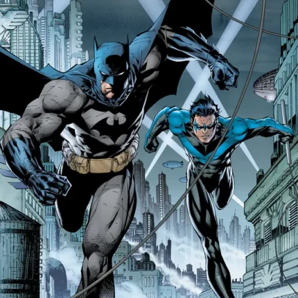 Batman and a blue-striped hero running across city rooftops under searchlights