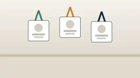 Illustration of printed name badges hanging from lanyards at a corporate event registration desk