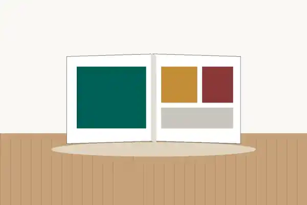Open custom photo book with blank photo layout pages on a wooden table
