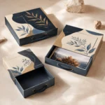 Flat navy and cream drawer boxes with leaf print and cord pulls
