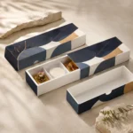 Long navy and ochre drawer boxes with an open three-compartment tray