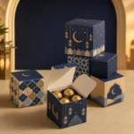 Navy Eid cube favour boxes with gold crescents and chocolates inside